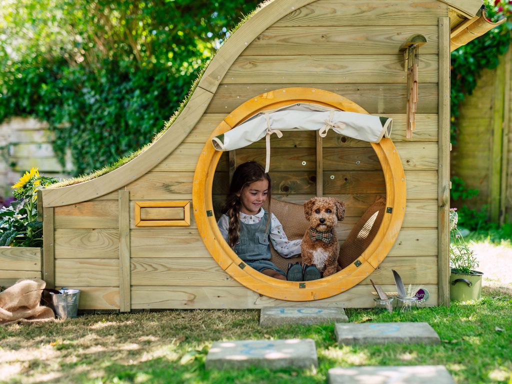 Plum Play Nature Play Hideaway Cubby, girl with dog